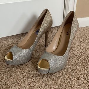 Guess stilettos. Size 8.5. Never been worn except in the store to try on.